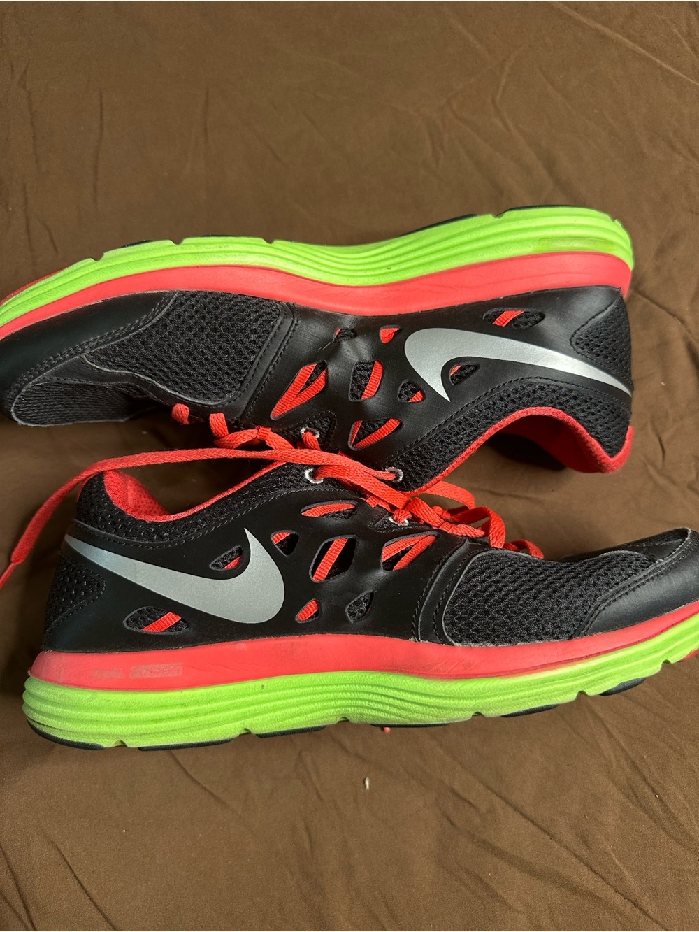 Nike Women’s Black Running Shoes with Neon Green & Red Accents
